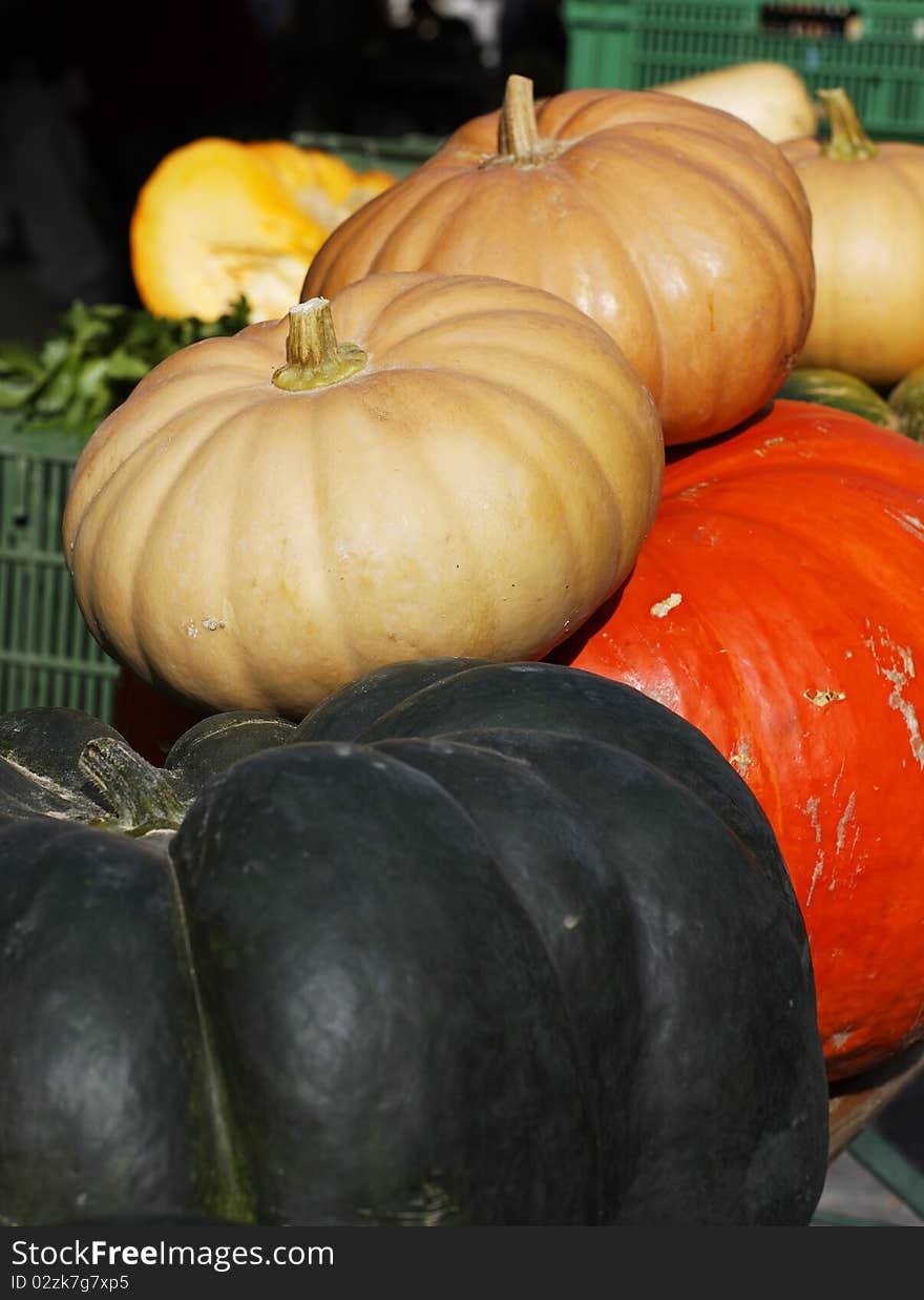 Pumpkins on market place in autumn