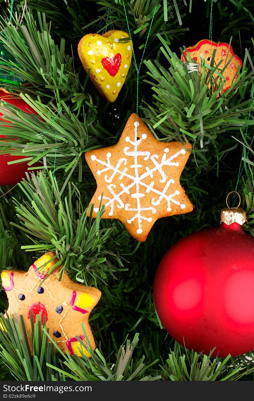 Christmas cookies and balloons on a branch