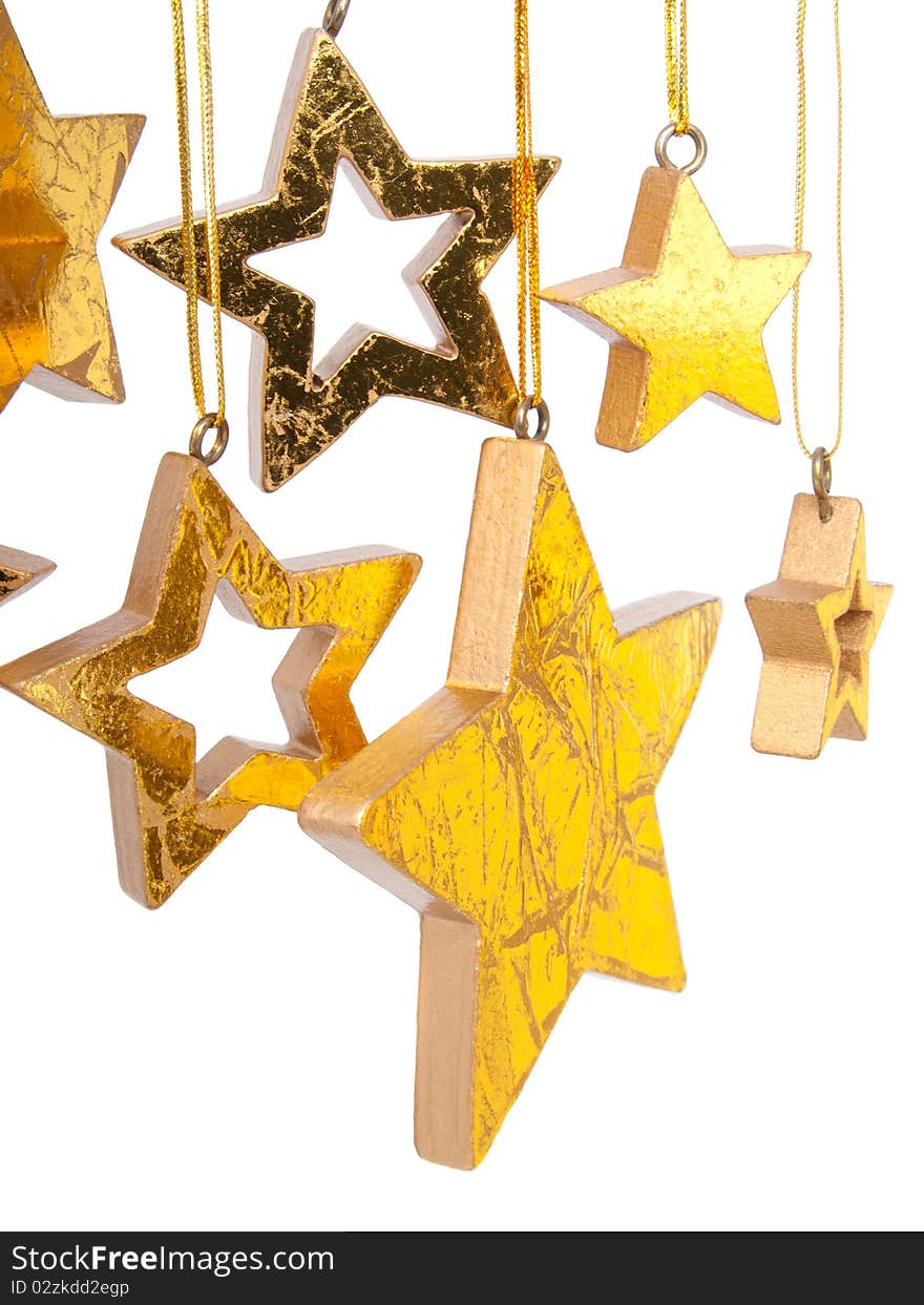 Golden Christmas stars, isolated on white background