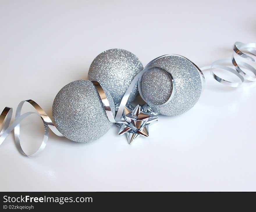 Silver Christmas balls and ribbon