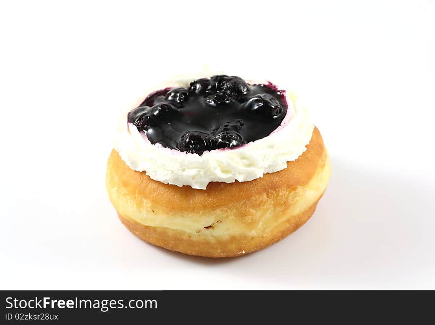 Bakery food blueberry fruit donut on white background isolated