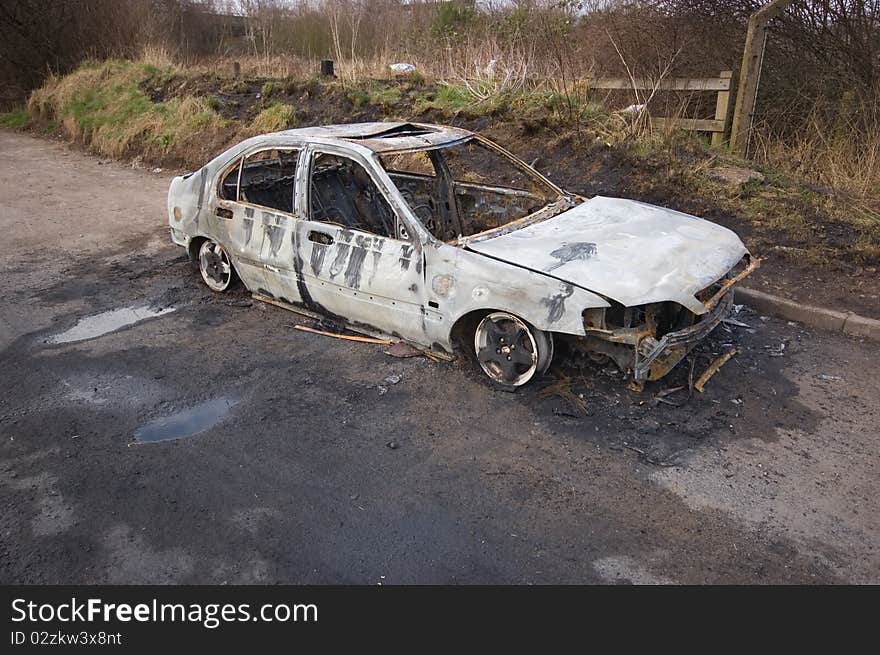 A stolen car, found burnt out in a side street.