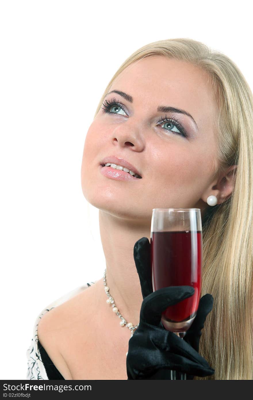 Blond in a dress drink wine