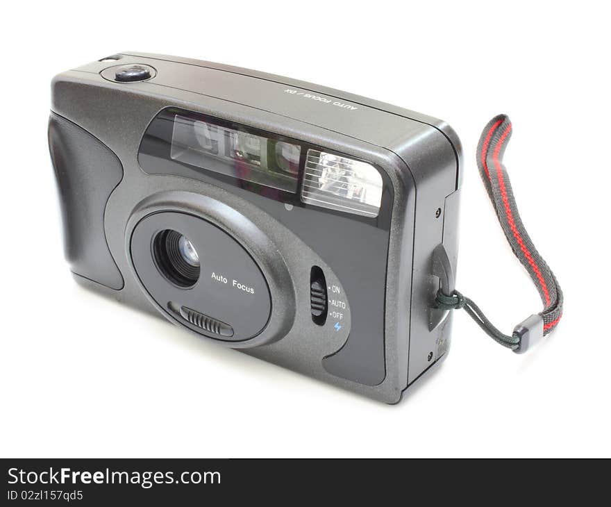 The old film camera of gray color on a white background