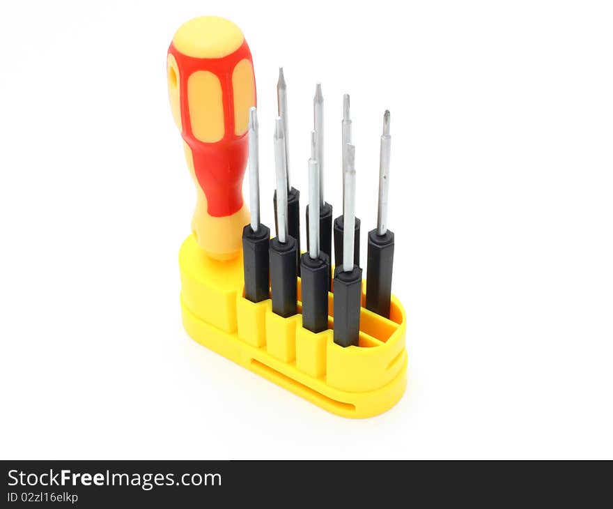 Set of screw-drivers with the orange handle on a white background