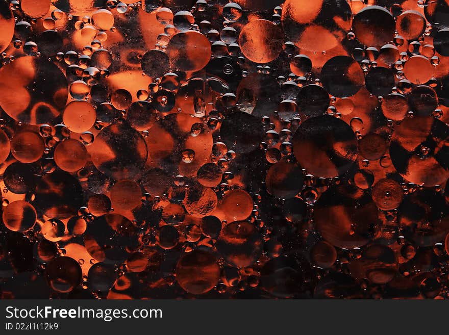 Red Bubbles of Oil Background