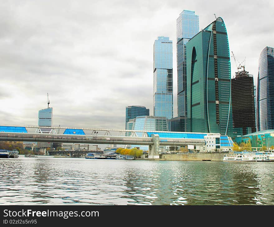 The image of skyscrapers on the embankment of Moscow river