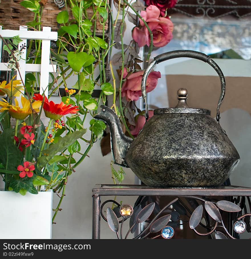 Details of the interior with decorative kettle .