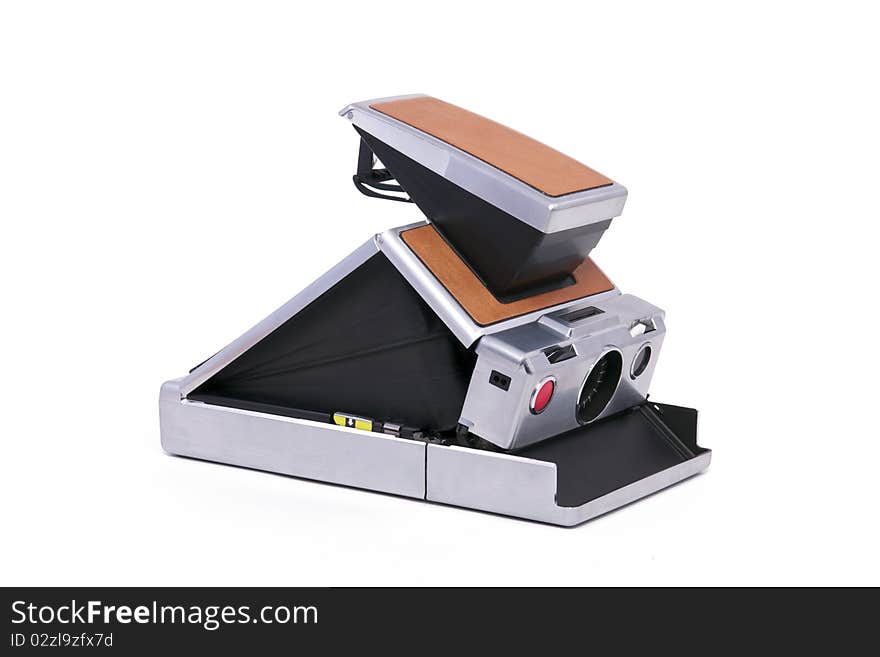 Vintage Folding Instant Camera Isolated on a White Background. Vintage Folding Instant Camera Isolated on a White Background