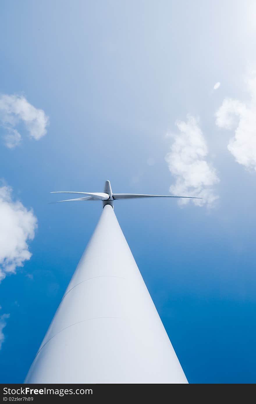 Frog perspective of an industrial wind turbine. Frog perspective of an industrial wind turbine