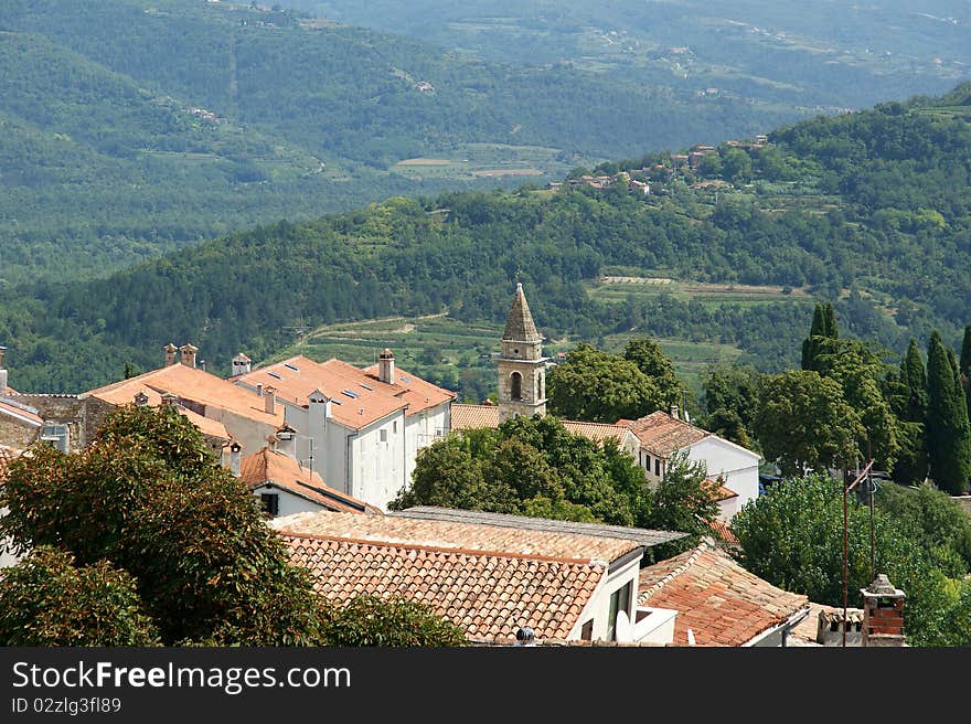 View of the house with red roofs and the valley