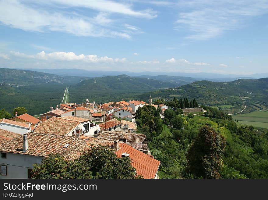 View of the house with red roofs and the valley