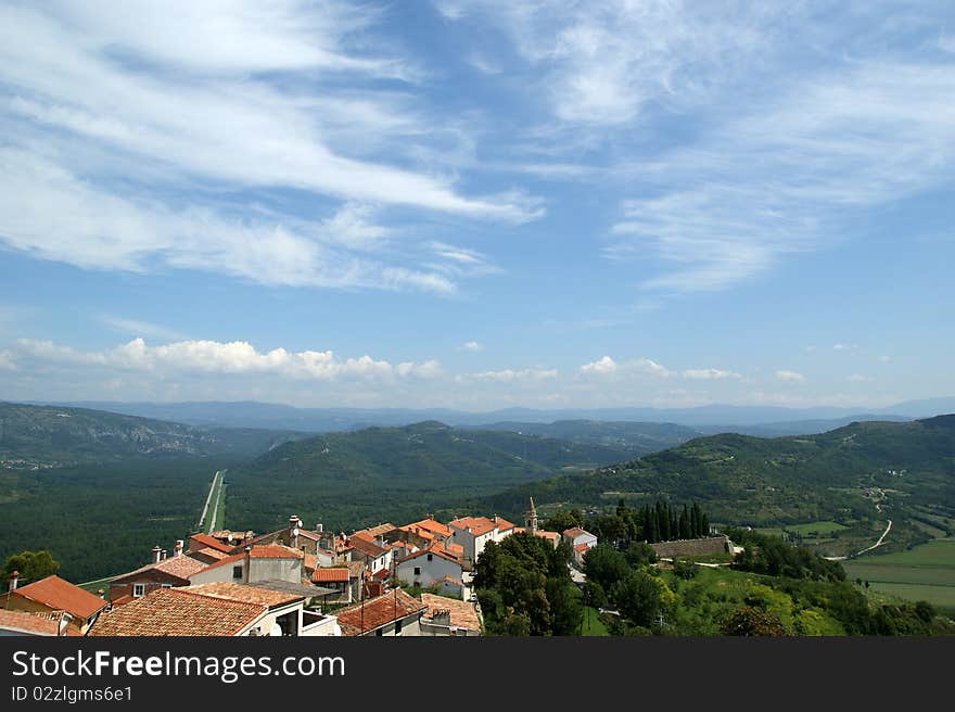 View of the house with red roofs and the valley