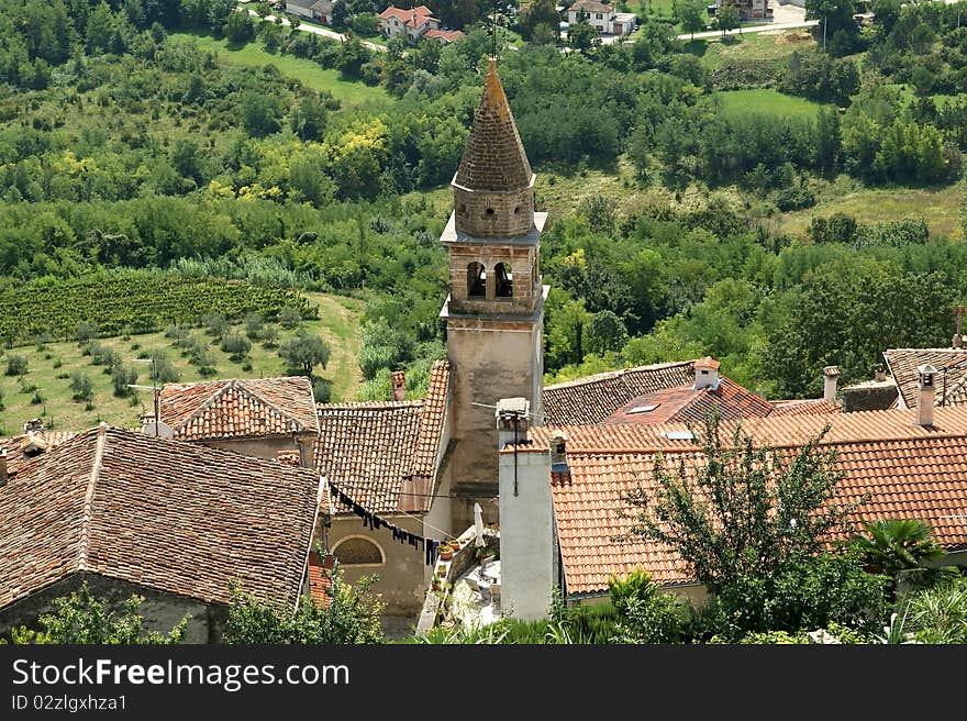 View of the house with red roofs and the valley