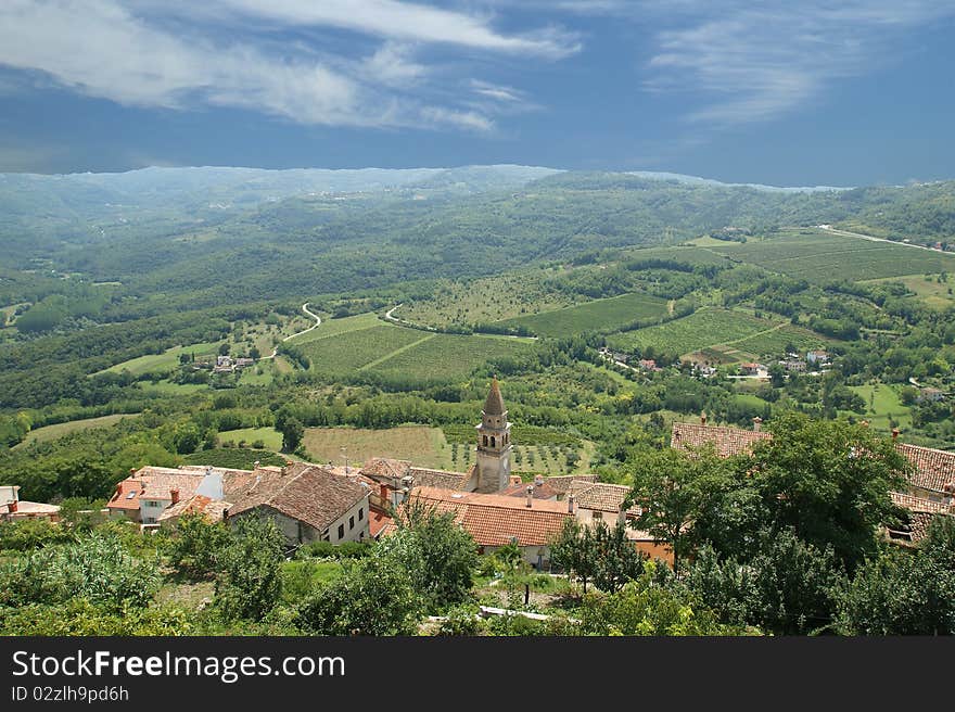 View of the house with red roofs and the valley