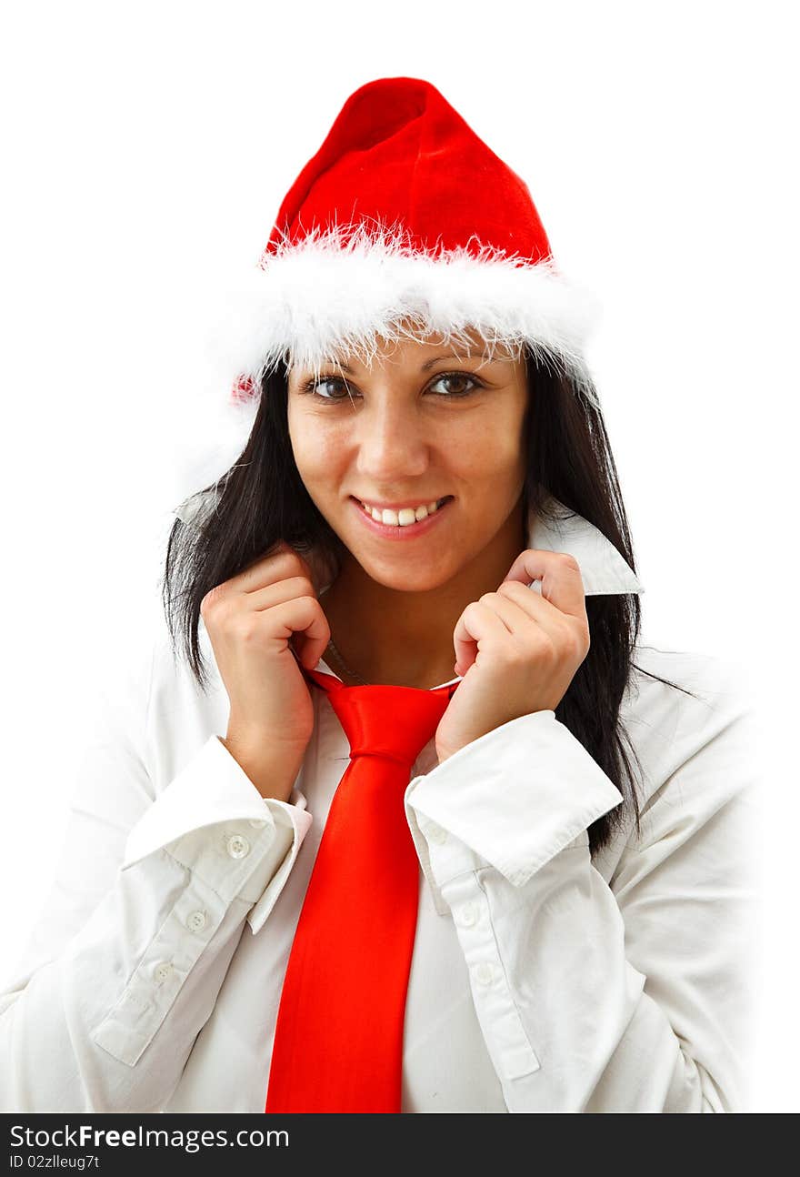 Attractive smiling woman in santa hat wearing a red tie. Attractive smiling woman in santa hat wearing a red tie