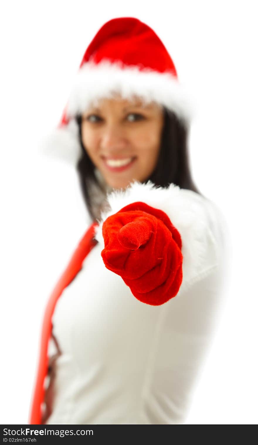 young Christmas woman in red gloves is pointing to us. young Christmas woman in red gloves is pointing to us