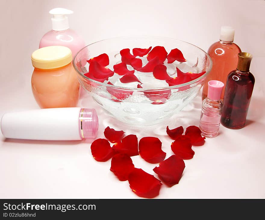 Spa hair mask creme liquid soap candle essences and red rose petals. Spa hair mask creme liquid soap candle essences and red rose petals