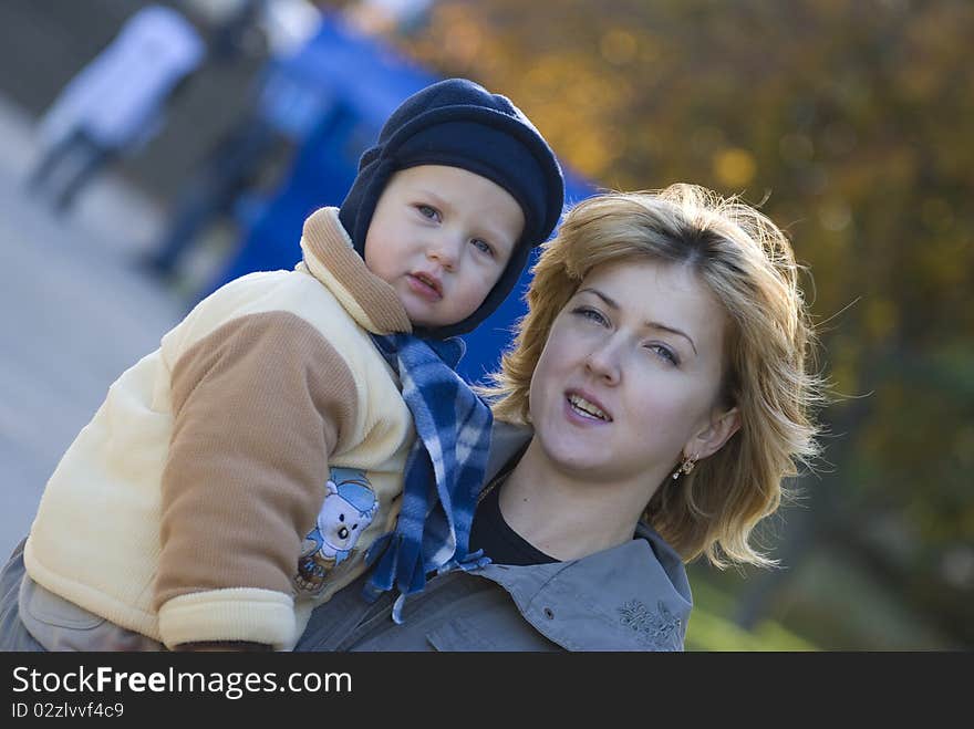 Mother and the son play park. Mother and the son play park