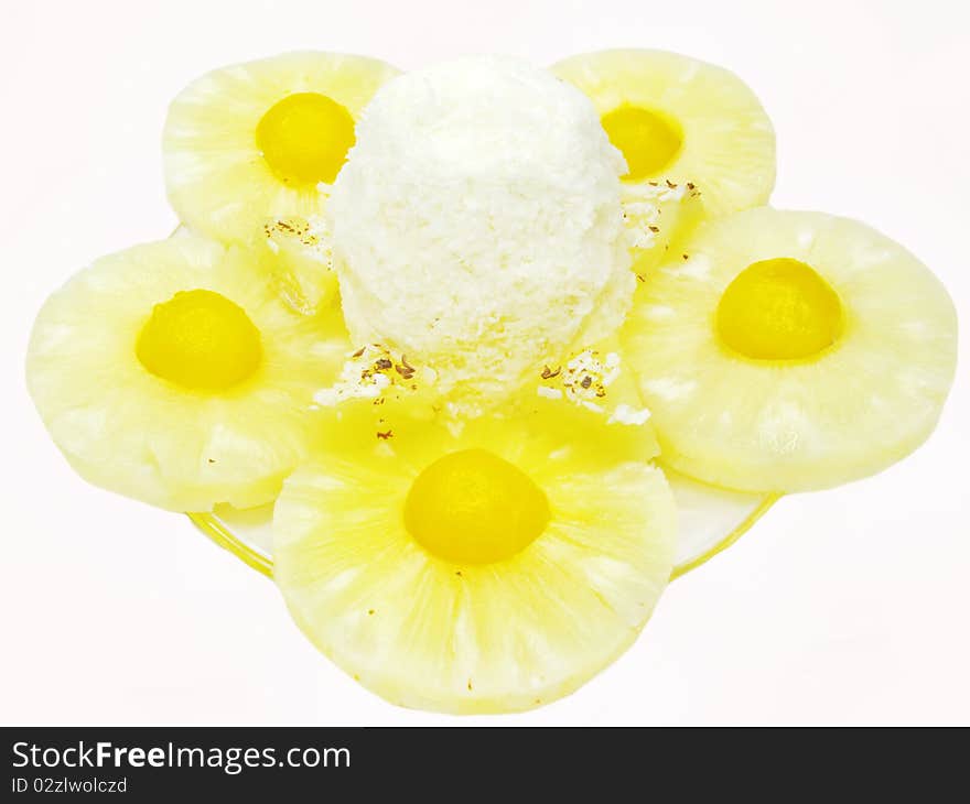 Ice-cream with pineapple slices in syrup