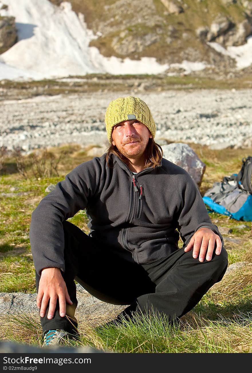 Portrait of man in Caucasus mountains in summer. Portrait of man in Caucasus mountains in summer