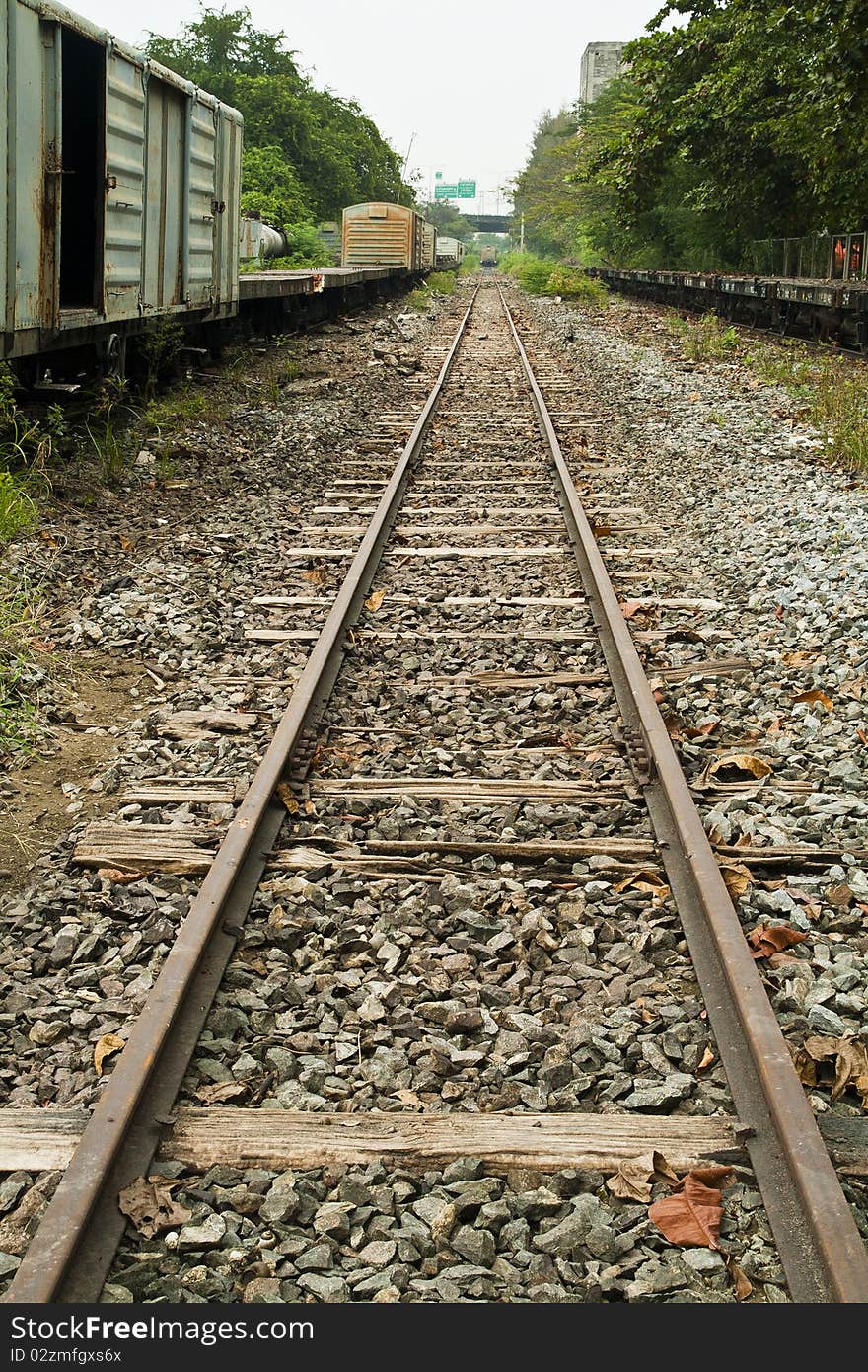 Old and rusted wagon trains over a railway. Old and rusted wagon trains over a railway.