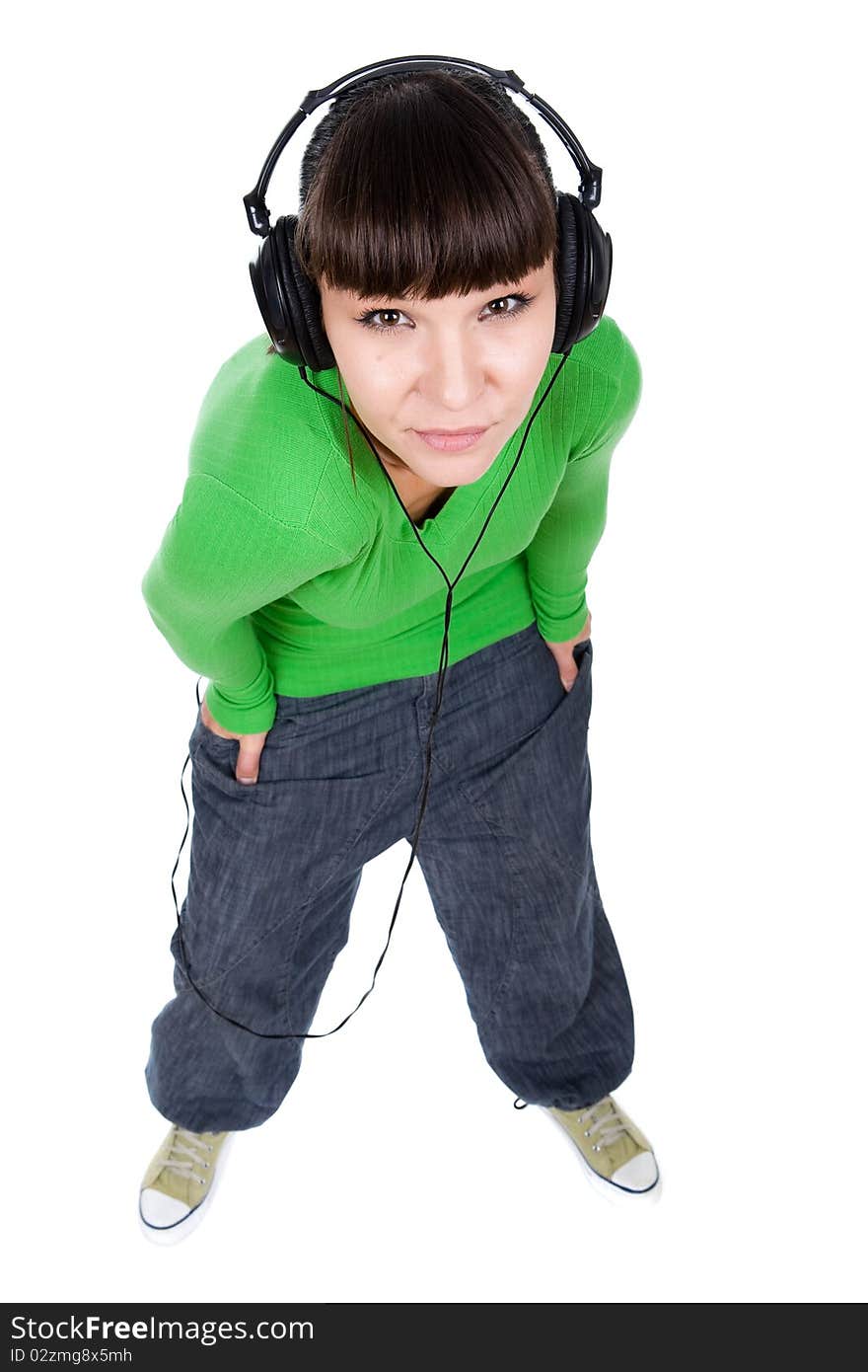 Young adult woman with headphones. over white background. Young adult woman with headphones. over white background