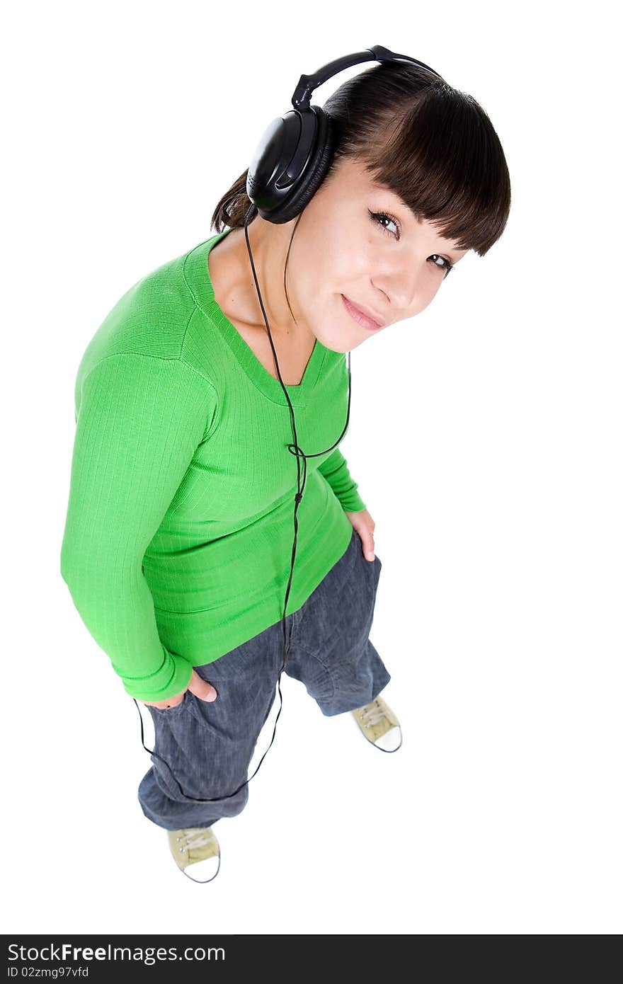 Young adult woman with headphones. over white background. Young adult woman with headphones. over white background