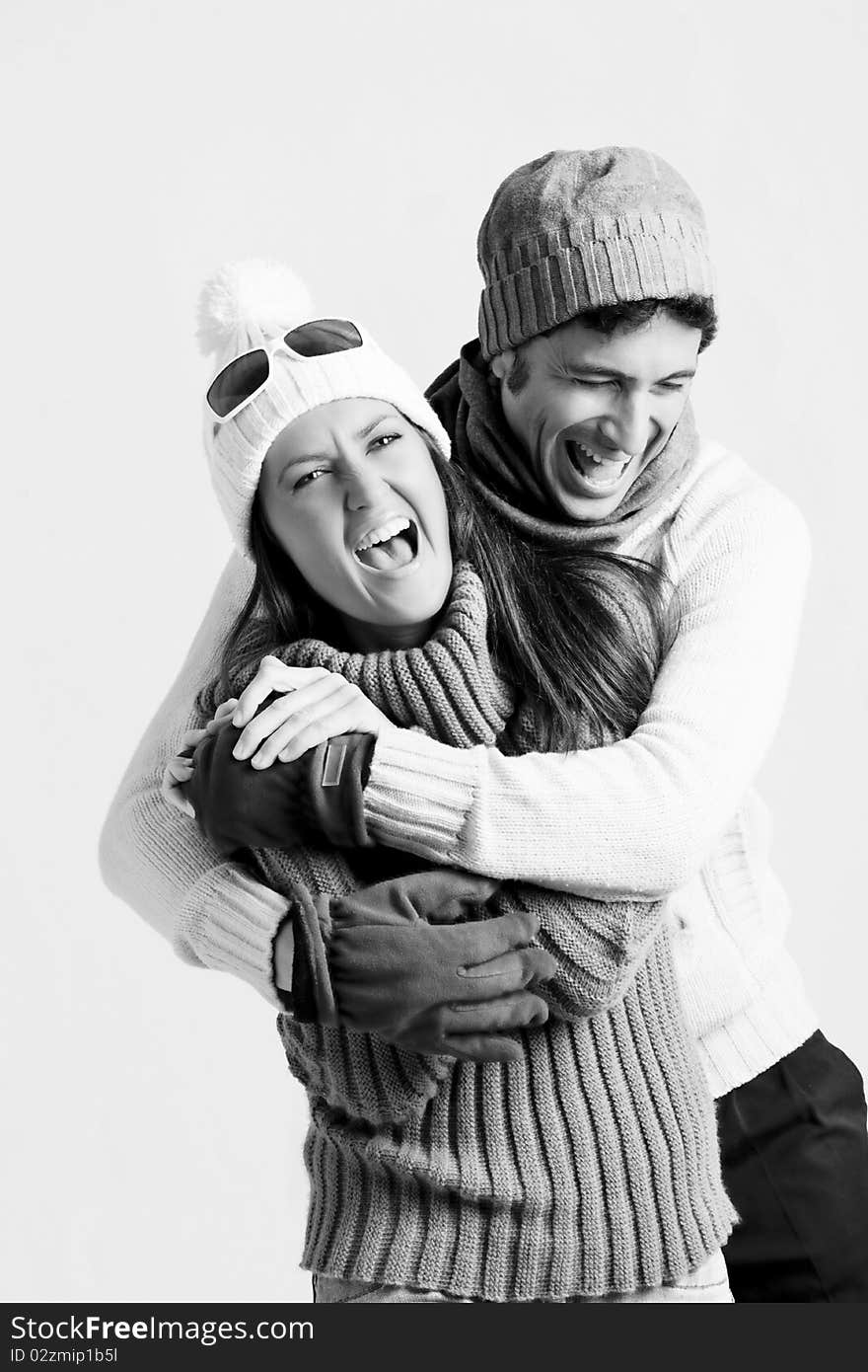 Young couple in winter clothes, enjoying their time together. Young couple in winter clothes, enjoying their time together