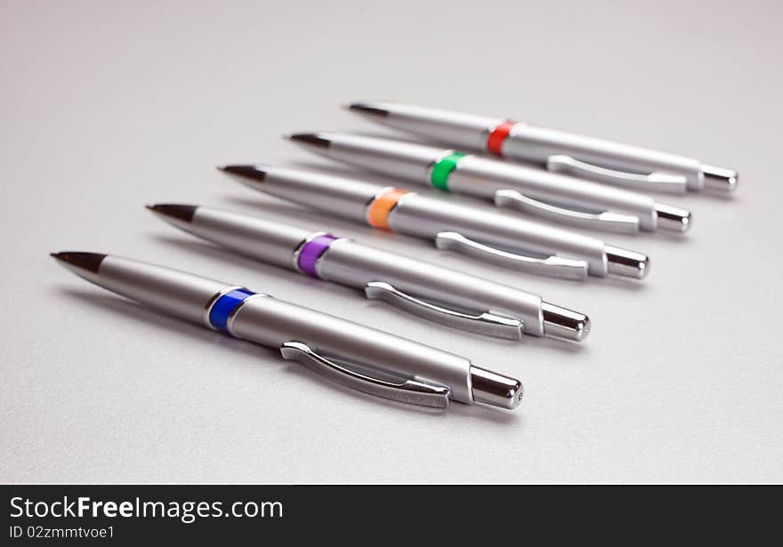 Set Of Colored Pens On Table