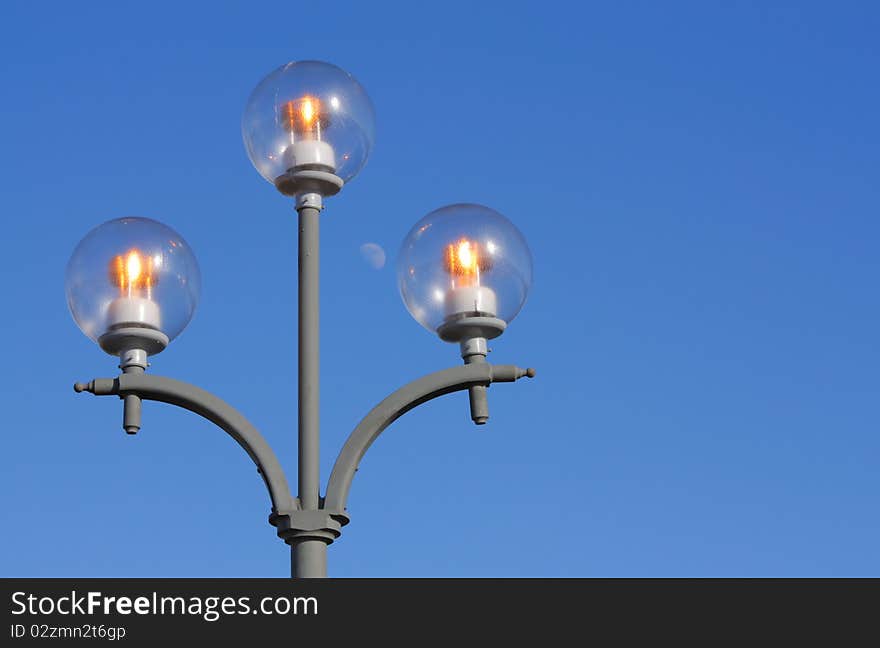 The street-lamp on a white background.