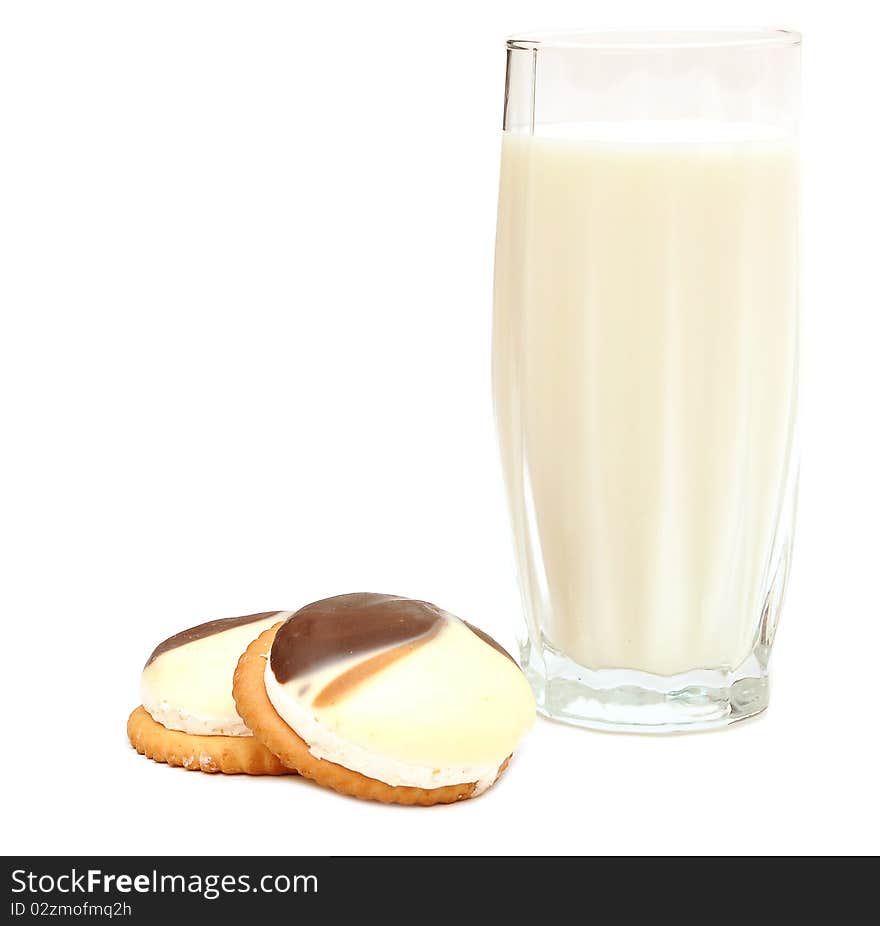 Chocolate chip cookies and a glass of milk isolated on white. Chocolate chip cookies and a glass of milk isolated on white