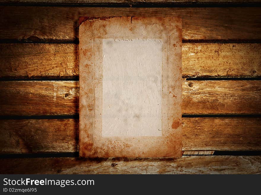 A old paper on wooden desks as a background or texture on white