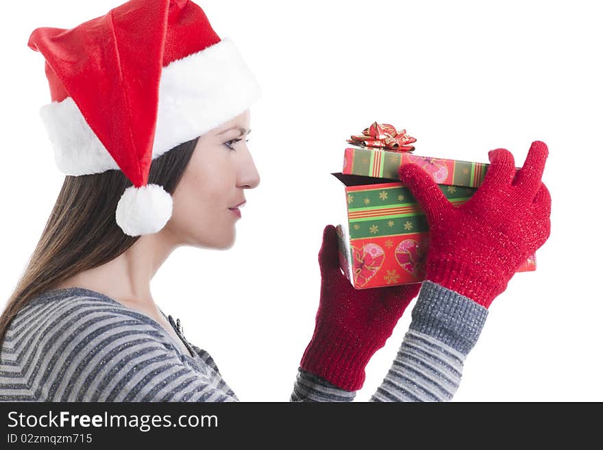 Happy young woman opening a Christmas present