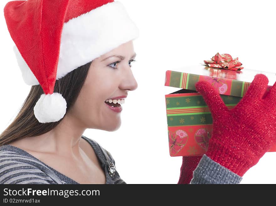 Happy young woman opening a Christmas present