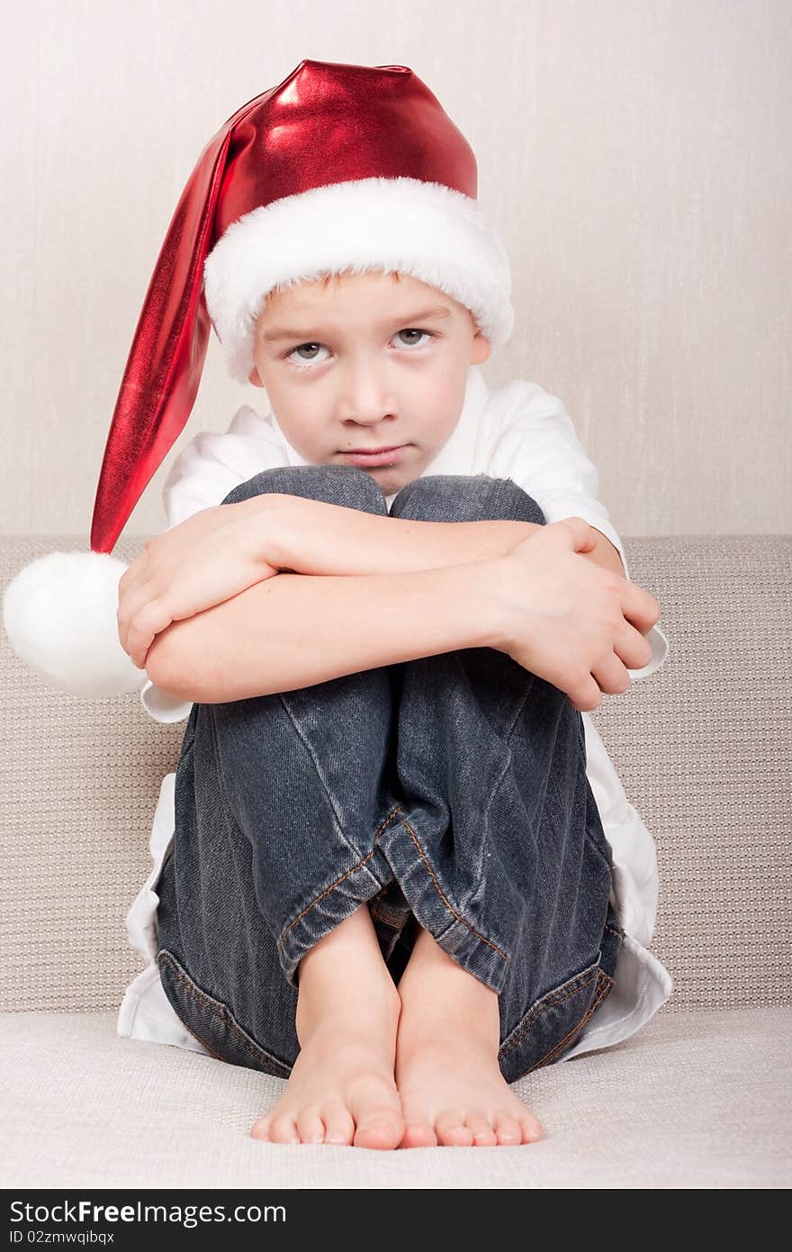 Boy in red christmas hat