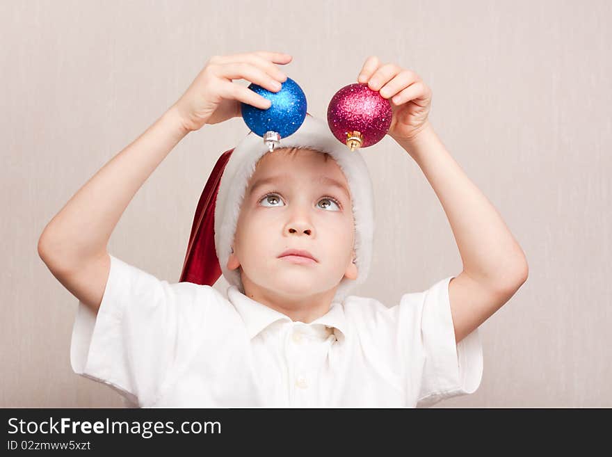 Boy in red christmas hat