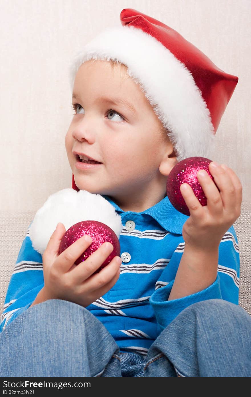 Boy in red christmas hat