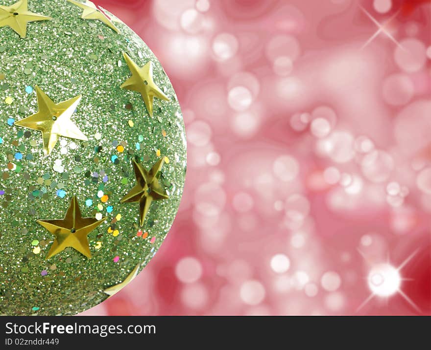 Green ball on red lights background, Christmas image. Green ball on red lights background, Christmas image