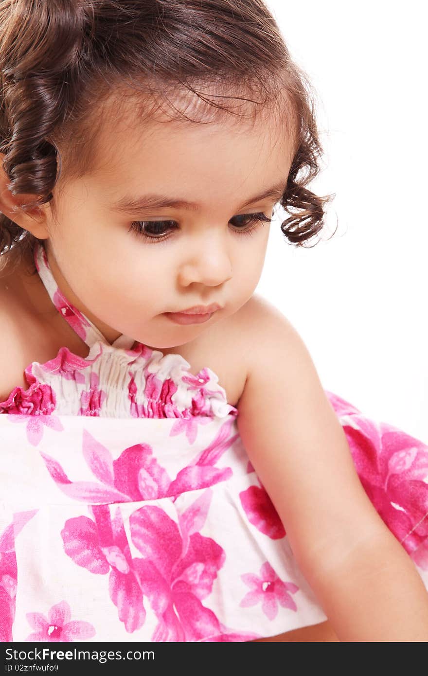 Beauty Little girl looking down over white background. Beauty Little girl looking down over white background