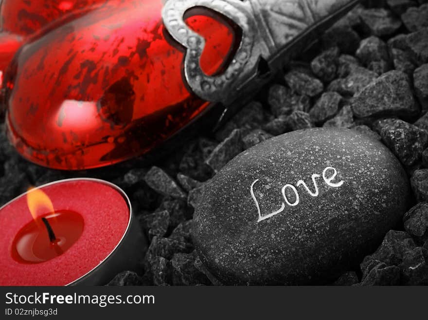 Love stil live with heart cabdle and a love stone. Love stil live with heart cabdle and a love stone.