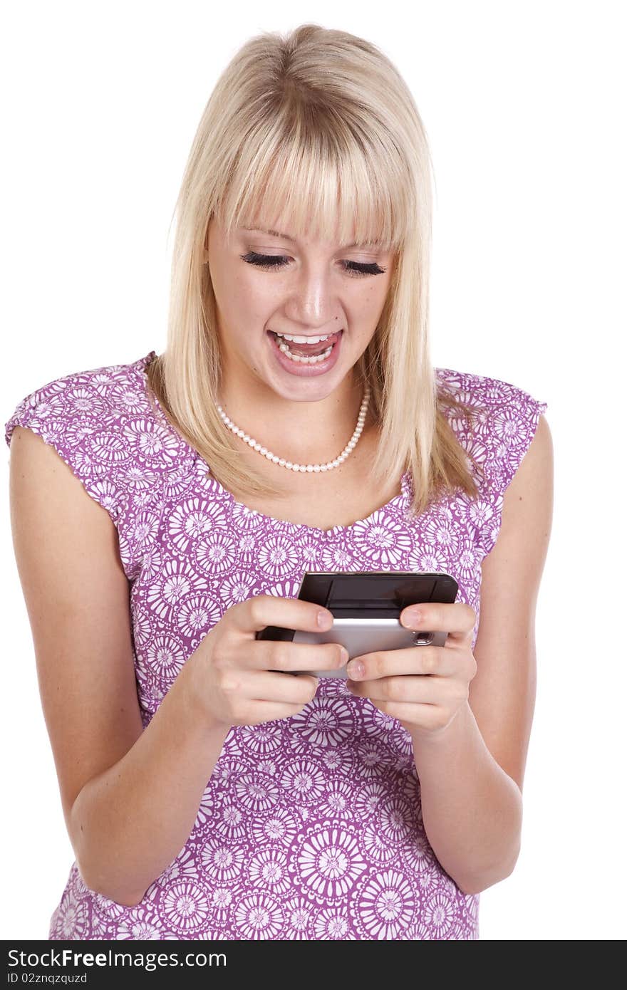 A woman showing her personality by texting something funny. A woman showing her personality by texting something funny.