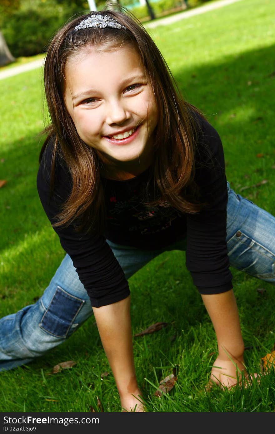 Cute and attractive girl posing and have fun in park. Cute and attractive girl posing and have fun in park