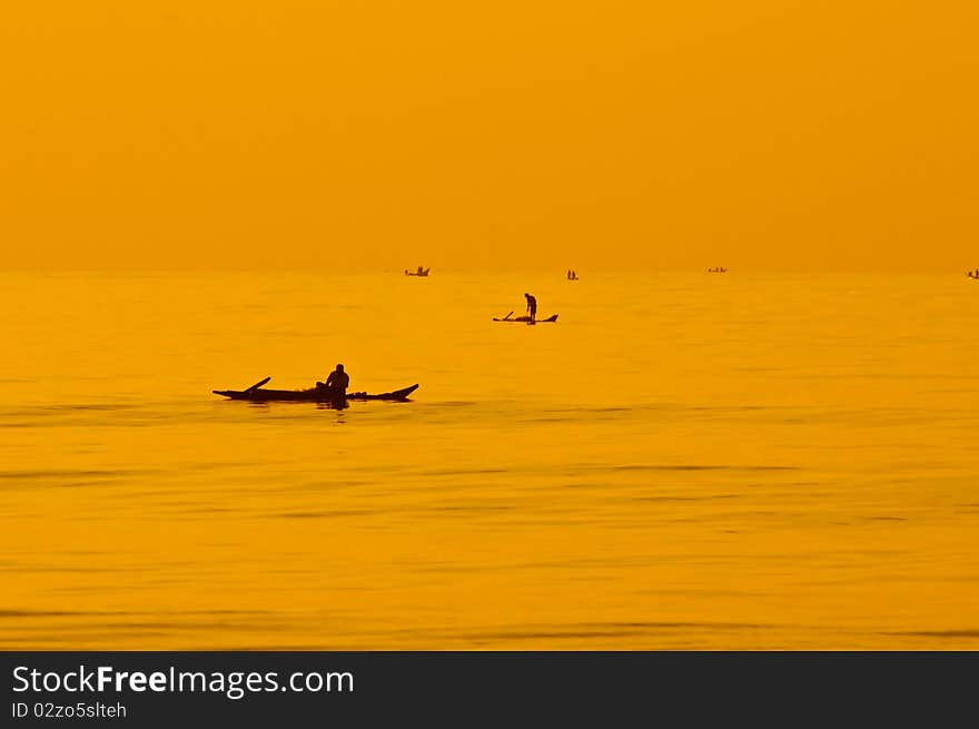 Fisherman working hard early morning at Bay of Bengal. Fisherman working hard early morning at Bay of Bengal