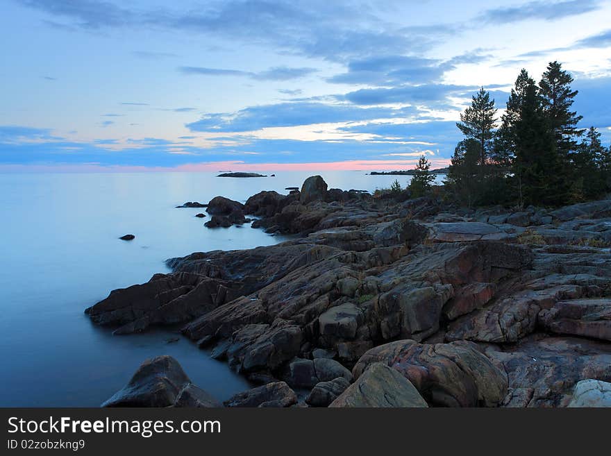 A calm coast landscape after sunset