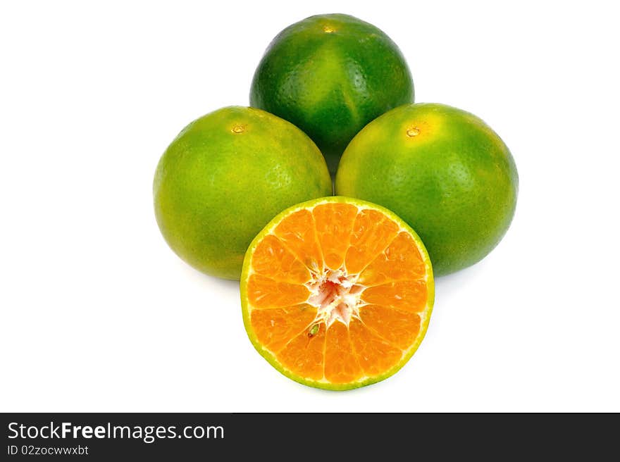 Close up of Oranges on White.