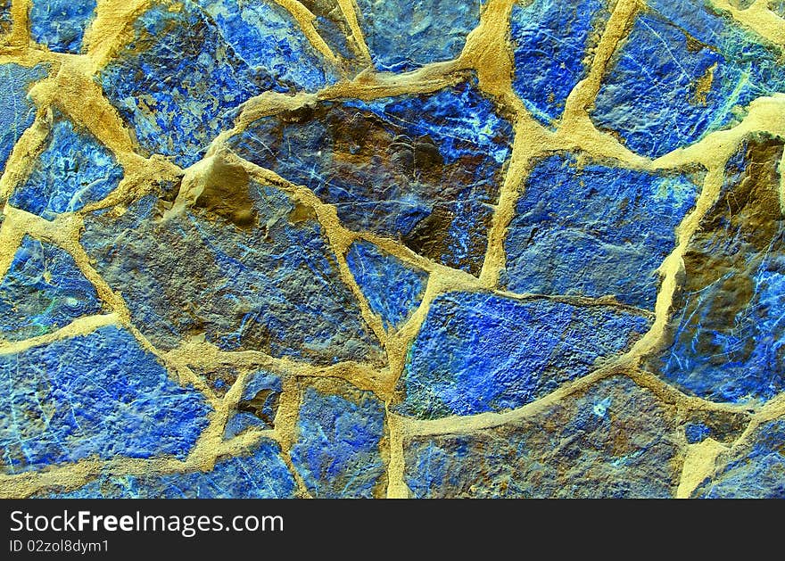 Beautiful stone texture in blue, yellow and brown tones. Beautiful stone texture in blue, yellow and brown tones.