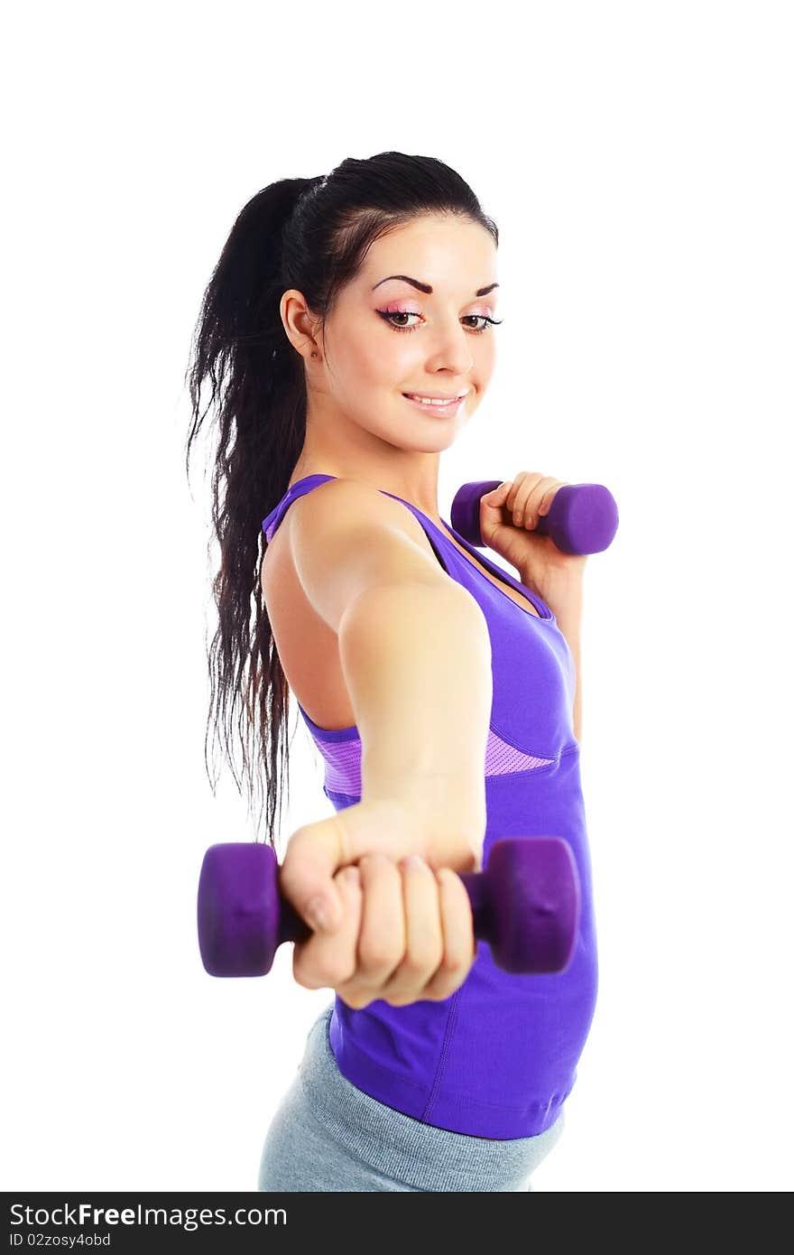 Girl with dumbbells