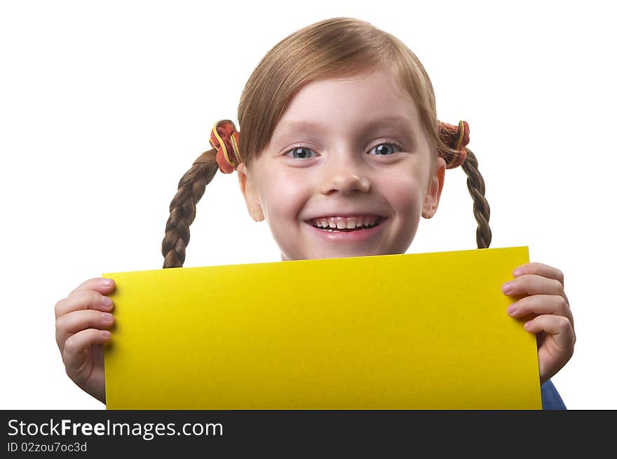 Little funny girl with yellow sheet of paper in the hands isolated over white background. Little funny girl with yellow sheet of paper in the hands isolated over white background