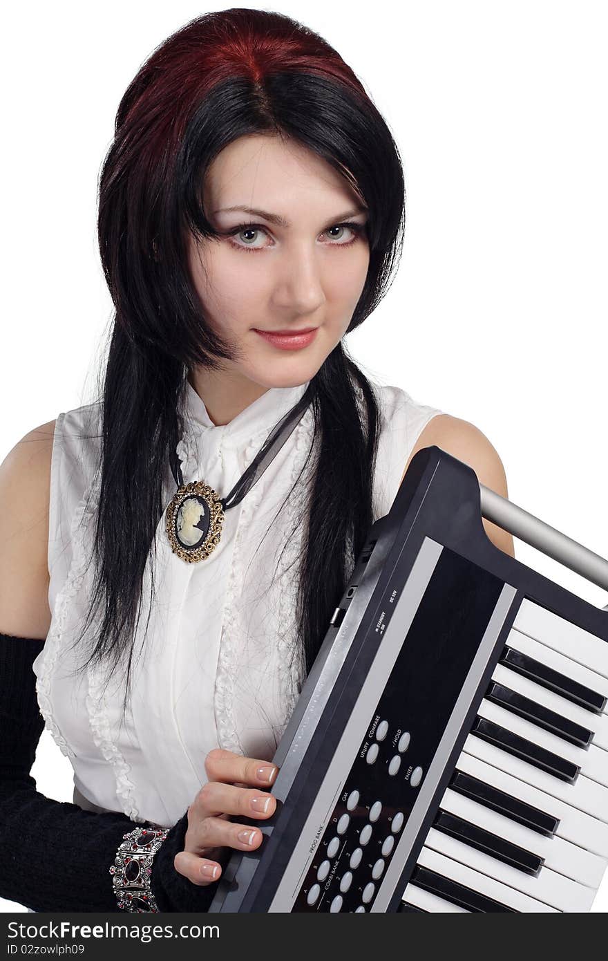 Beautiful girl with synthesizer isolated